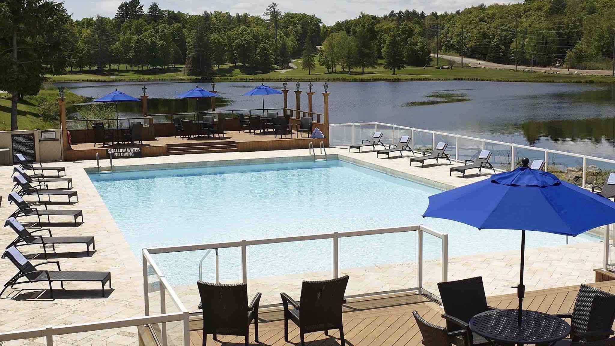 Pinestone Resort Haliburton Hotels swimming pool in summer